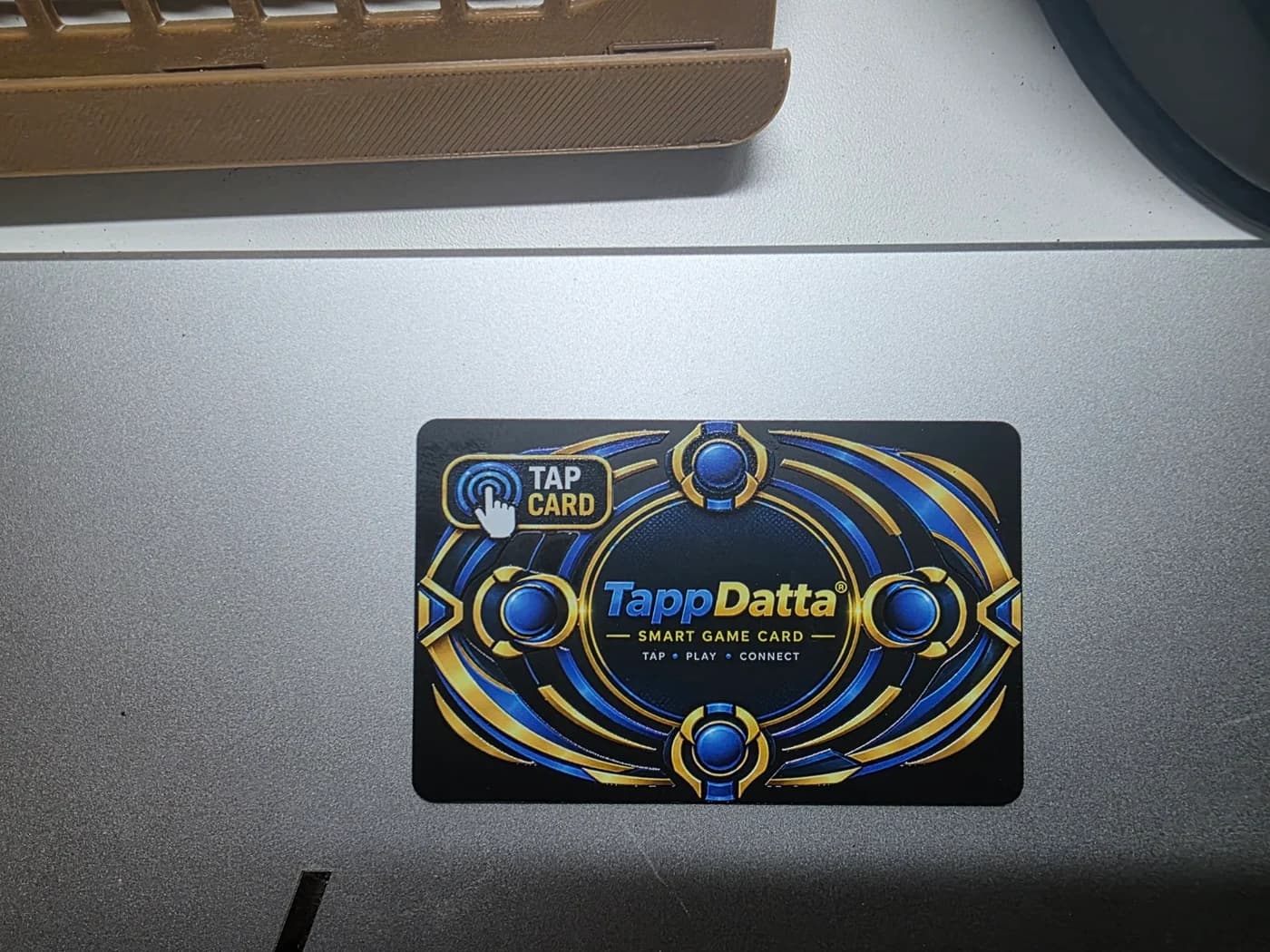 TappDatta Game Card placed on a table for play
